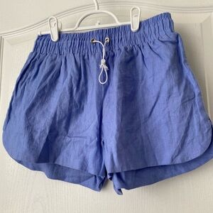 Millau blue shorts. Sides are ladder stitched. NWT. Pull cord waist.